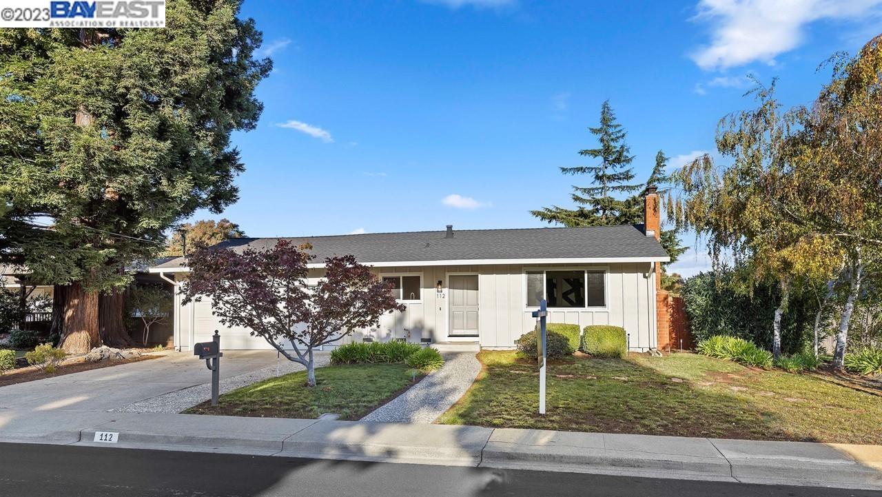 112 Mills Place San Ramon, CA 94583 - Photo 1 of 1 a front view of a house with garden