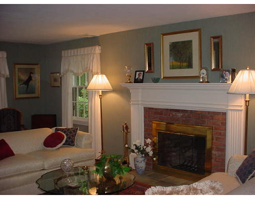 50 Dennis Road Longmeadow, MA 01106 - Photo 15 of 18 a living room with furniture and a fireplace