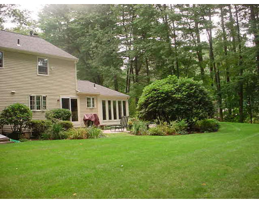 50 Dennis Road Longmeadow, MA 01106 - Photo 7 of 18 a front view of a house with garden