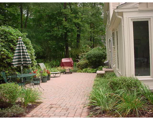 50 Dennis Road Longmeadow, MA 01106 - Photo 8 of 18 a backyard of a house with outdoor seating