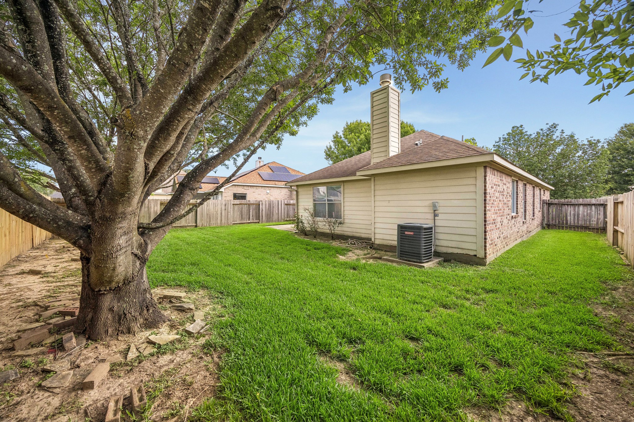 24027 Floragate Drive Spring, TX 77373 - Photo 2 of 21 a view of a house with backyard and garden