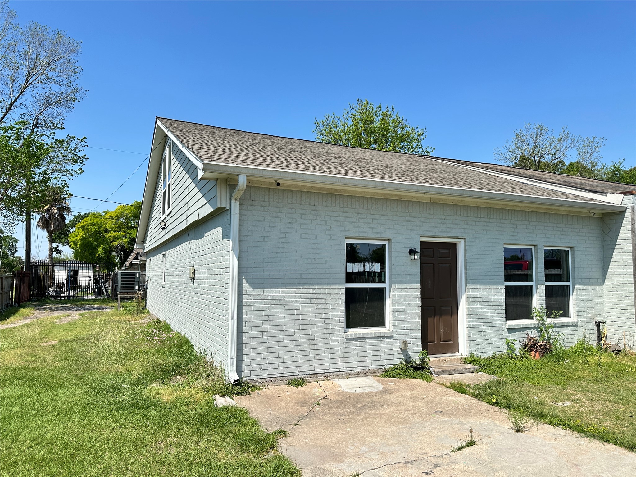 12703 West Hardy Road Houston, TX 77037 - Photo 5 of 29 a view of a house with a yard
