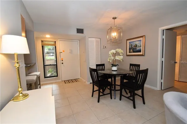 a view of a dining room with furniture
