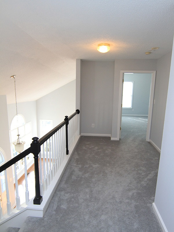9021 Breeland Way Raleigh, NC 27613 - Photo 16 of 20 Hallway shows the private entry to the master as it is away from the other 3 bedrooms and the hustle bustle! Note the architectural feature of the alcove to the left! Just right for displaying those art treasures or perhaps turning into a bookcase! Master BR Hallway
