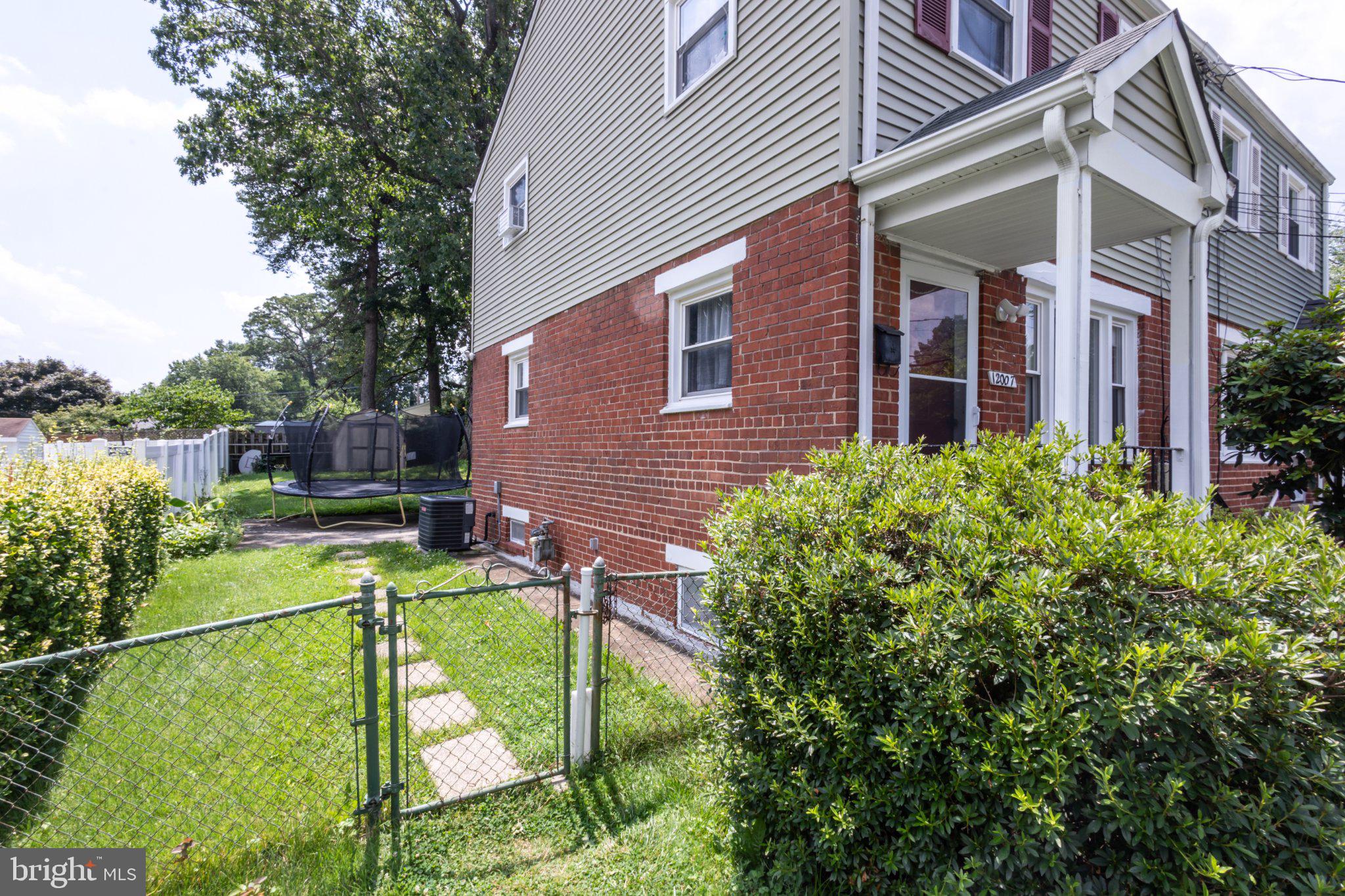 12007 Livingston Street Silver Spring, MD 20902 - Photo 2 of 16 Fenced In Backyard