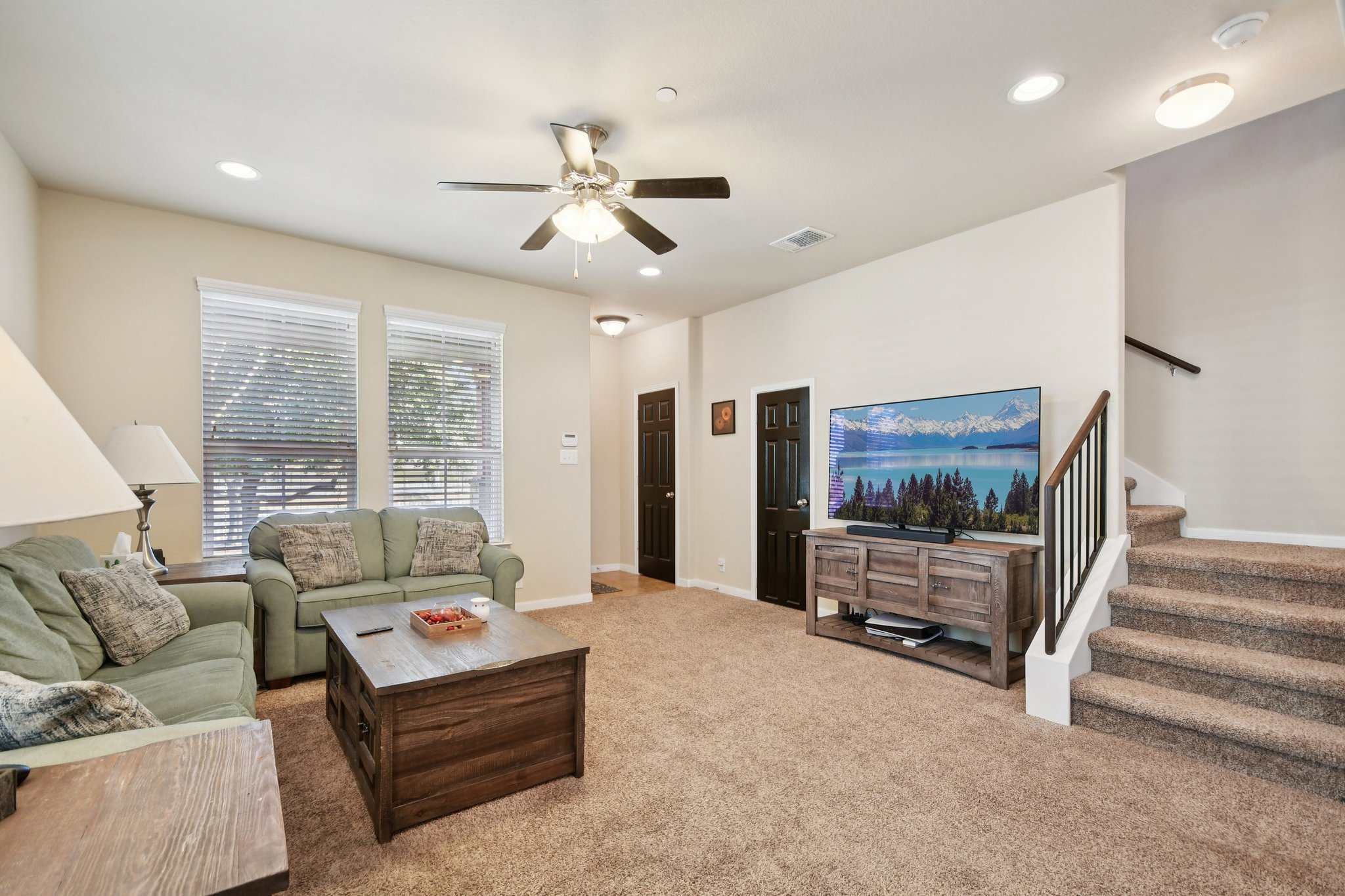 616 Lookout Tree Lane Round Rock, TX 78664 - Photo 3 of 39 Living area featuring light carpet, a ceiling fan, and recessed lighting