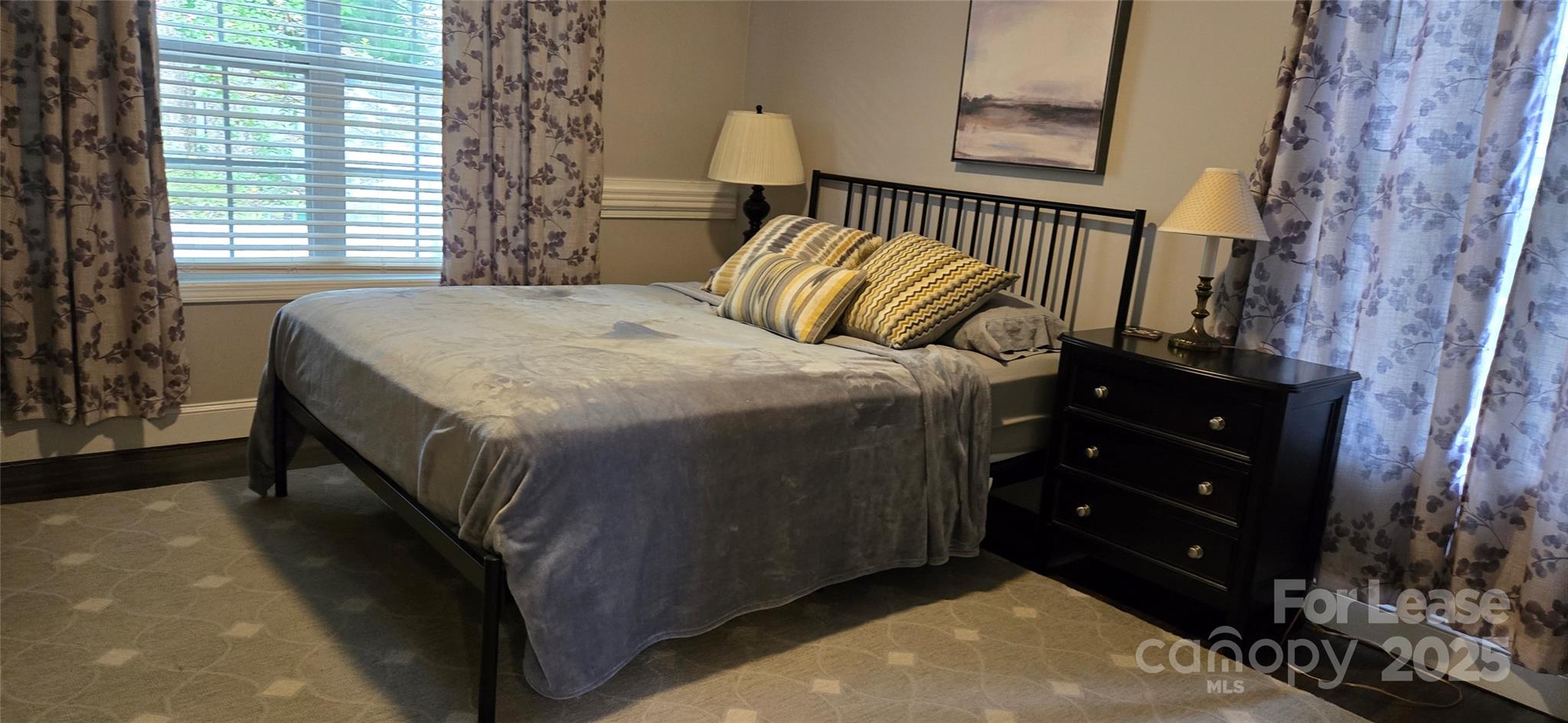 1144 Blowing Rock Cove Fort Mill, SC 29708 - Photo 16 of 23 a bedroom with a bed and a window