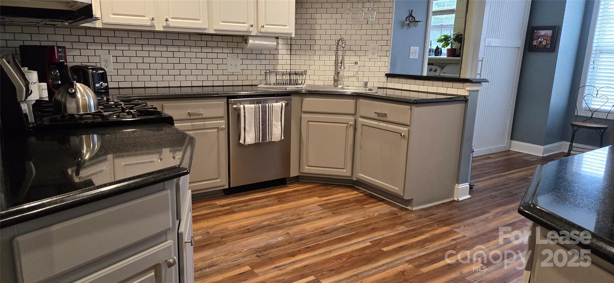 1144 Blowing Rock Cove Fort Mill, SC 29708 - Photo 8 of 23 a kitchen with a sink and cabinets