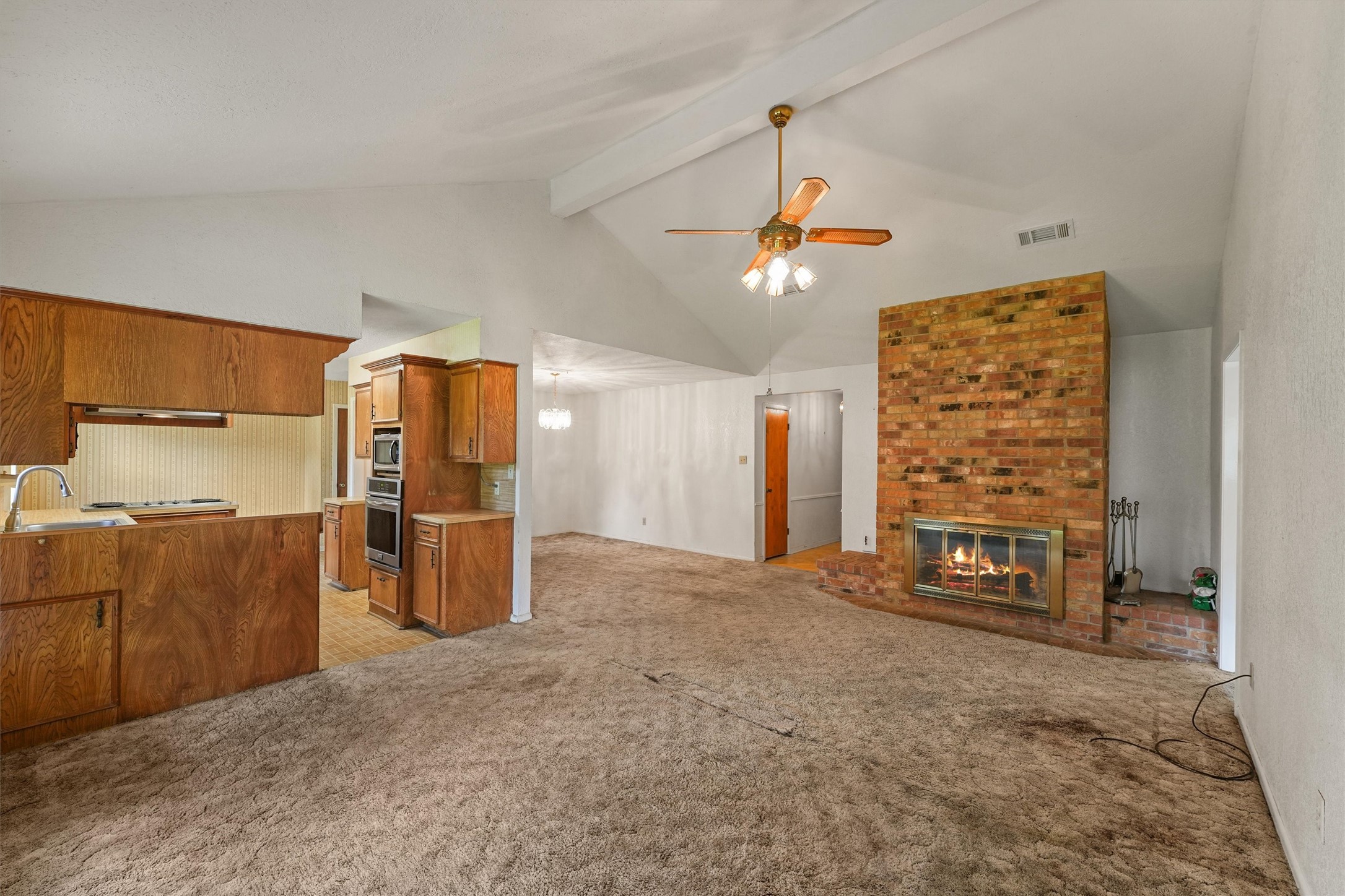 5103 Forest Trail Baytown, TX 77521 - Photo 6 of 25 an empty room with furniture and a flat screen tv