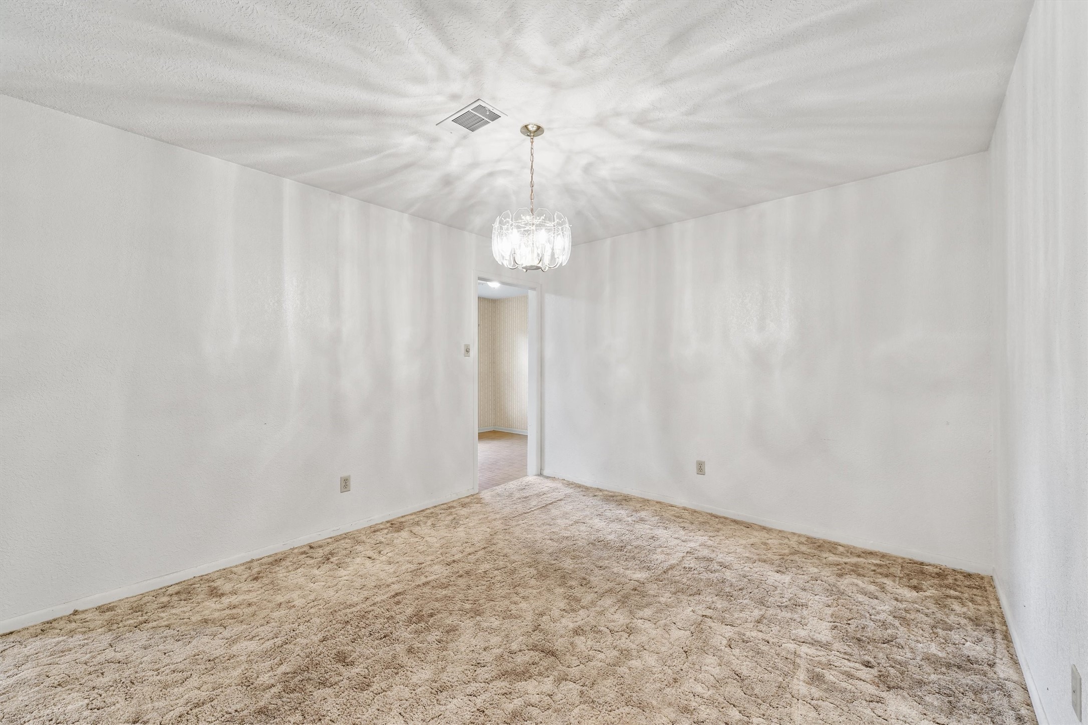5103 Forest Trail Baytown, TX 77521 - Photo 8 of 25 a view of an empty room and chandelier fan