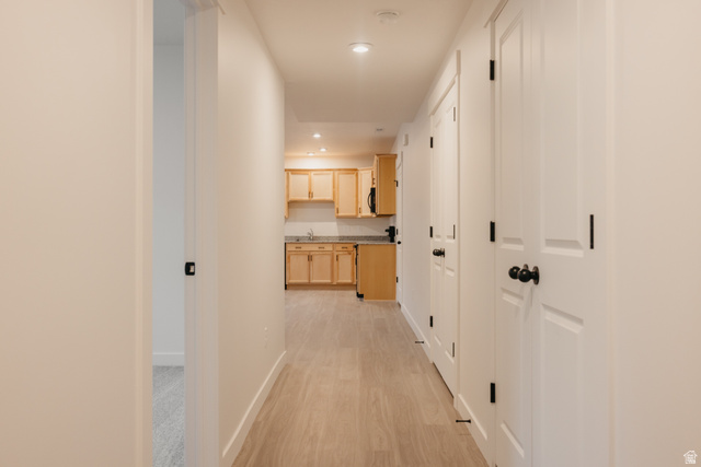 4595 North Fallow Way, Unit 511 Eagle Mountain, UT 84005 - Photo 7 of 32 Corridor with recessed lighting and light wood-type flooring