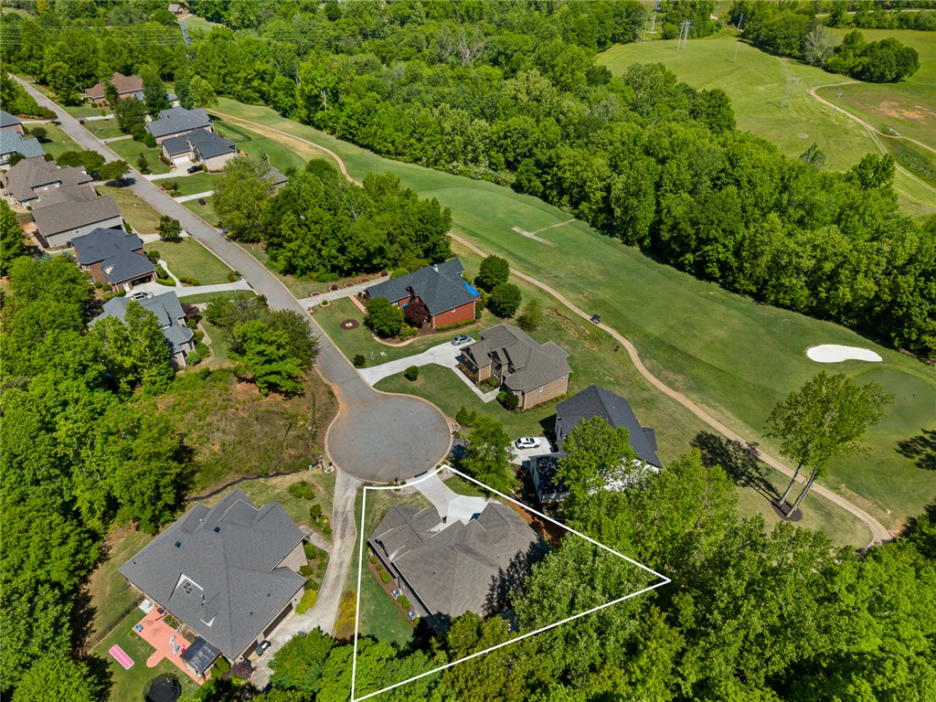 140 Turnberry Road Anderson, SC 29621 - Photo 36 of 44 This aerial view showcases a vibrant community nestled alongside a verdant golf course.