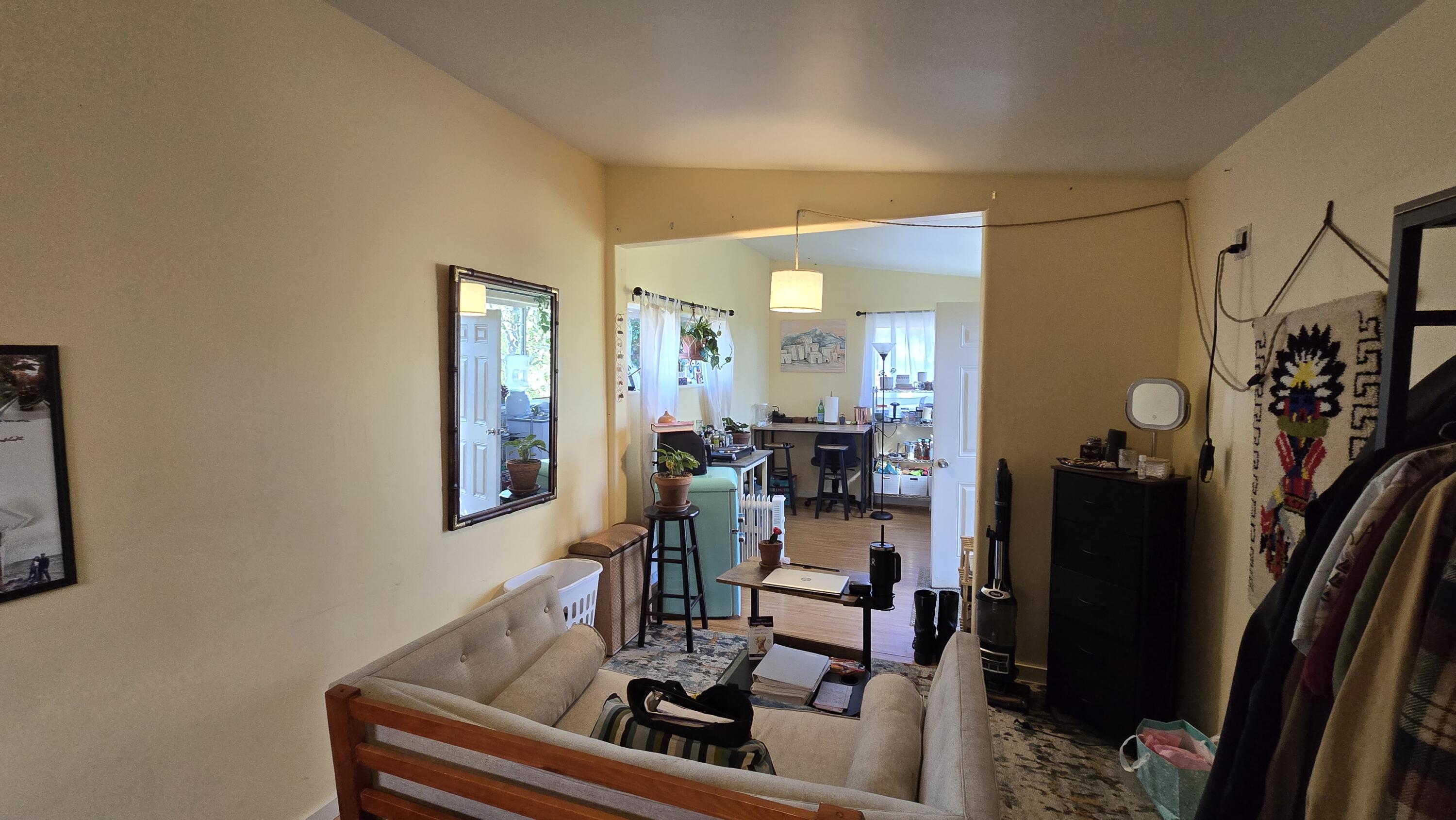 488 Crowson Road Ashland, OR 97520 - Photo 24 of 30 a view of a hallway with workspace and living room