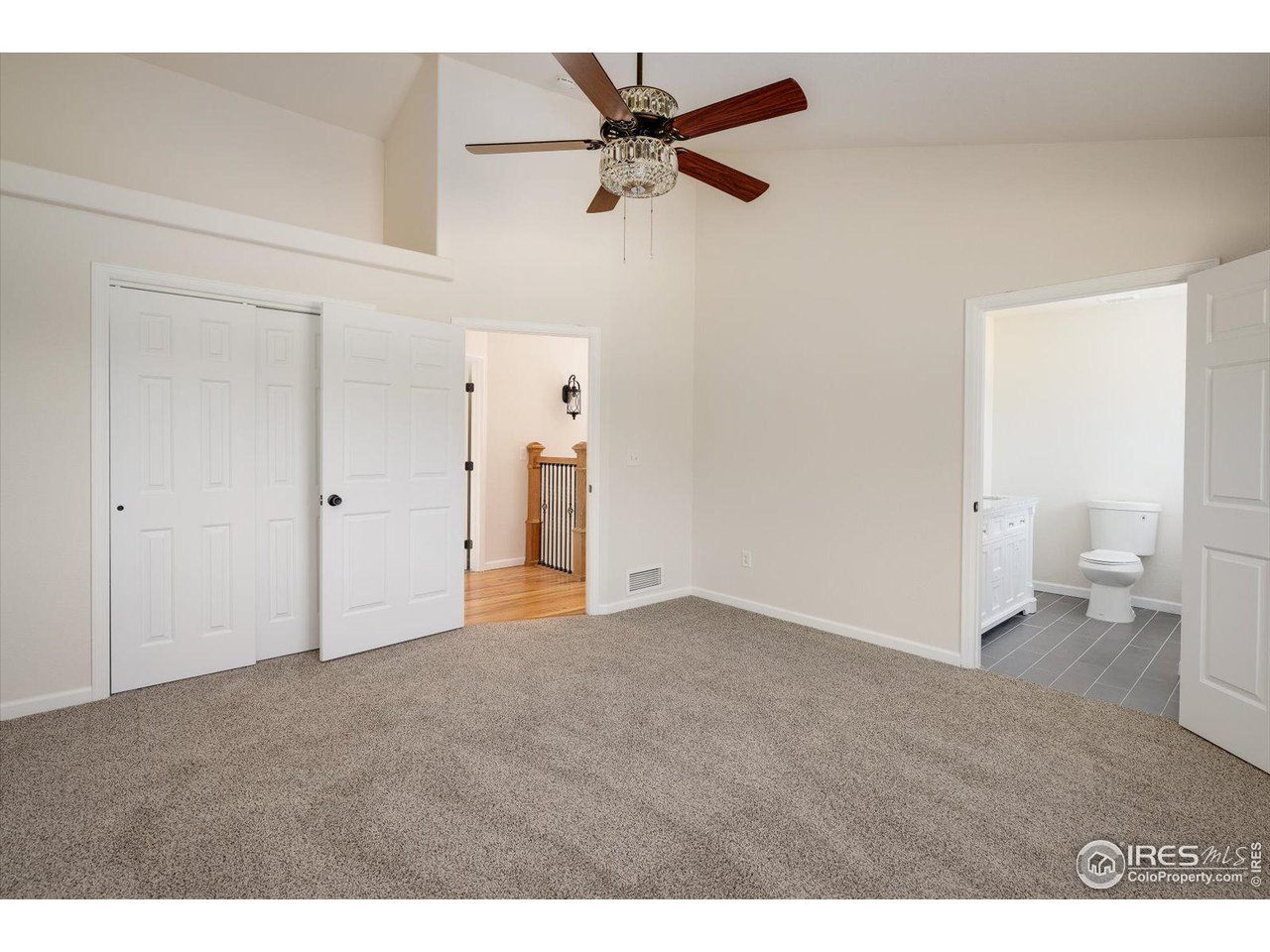 147 Makah Lane Lyons, CO 80540 - Photo 12 of 39 a view of an empty room and a ceiling fan