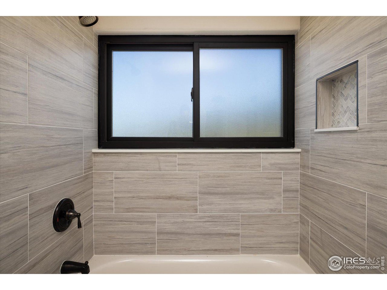147 Makah Lane Lyons, CO 80540 - Photo 14 of 39 a bathroom with a sink and a mirror