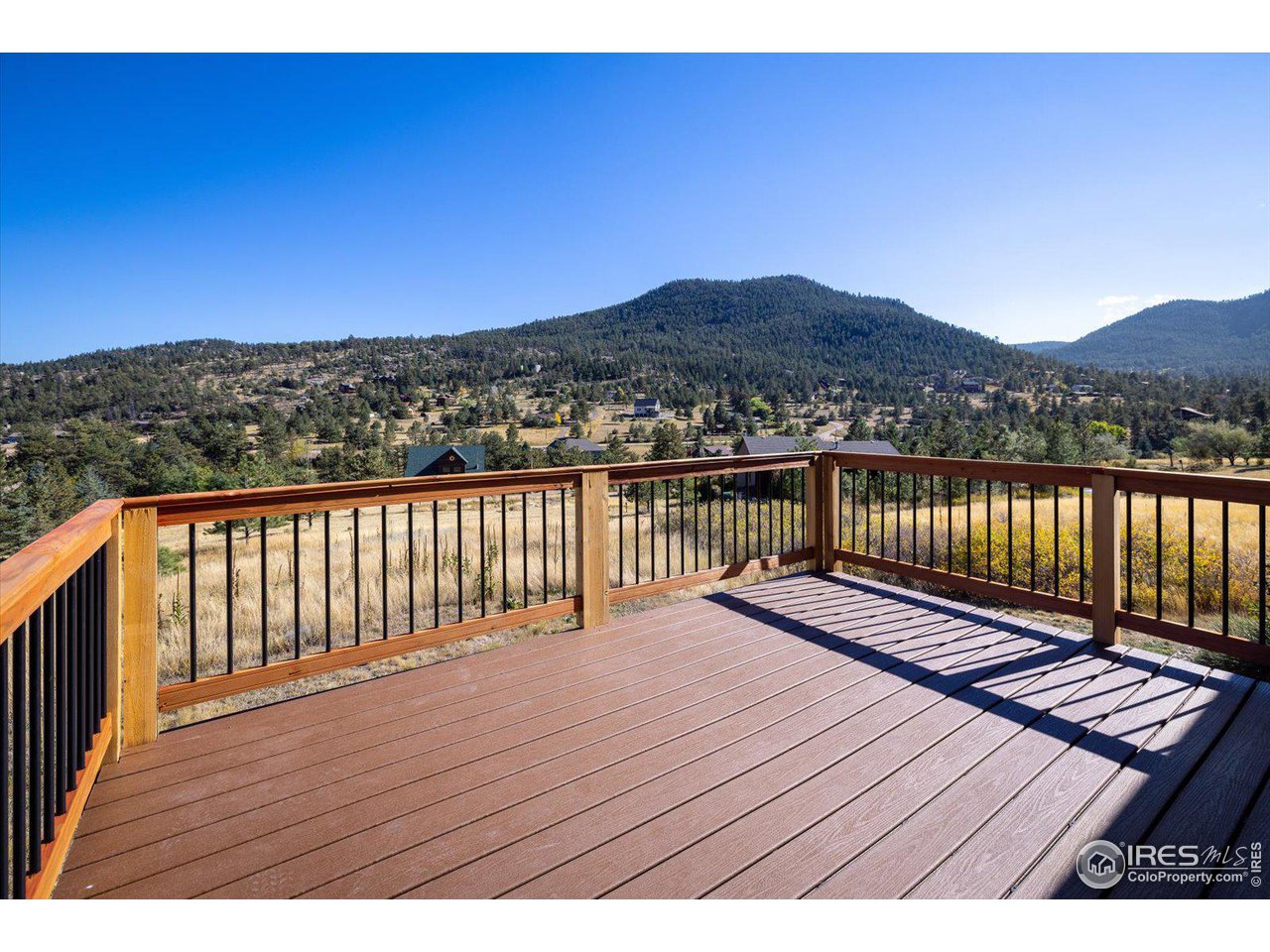 147 Makah Lane Lyons, CO 80540 - Photo 3 of 39 a view of wooden balcony with a floor
