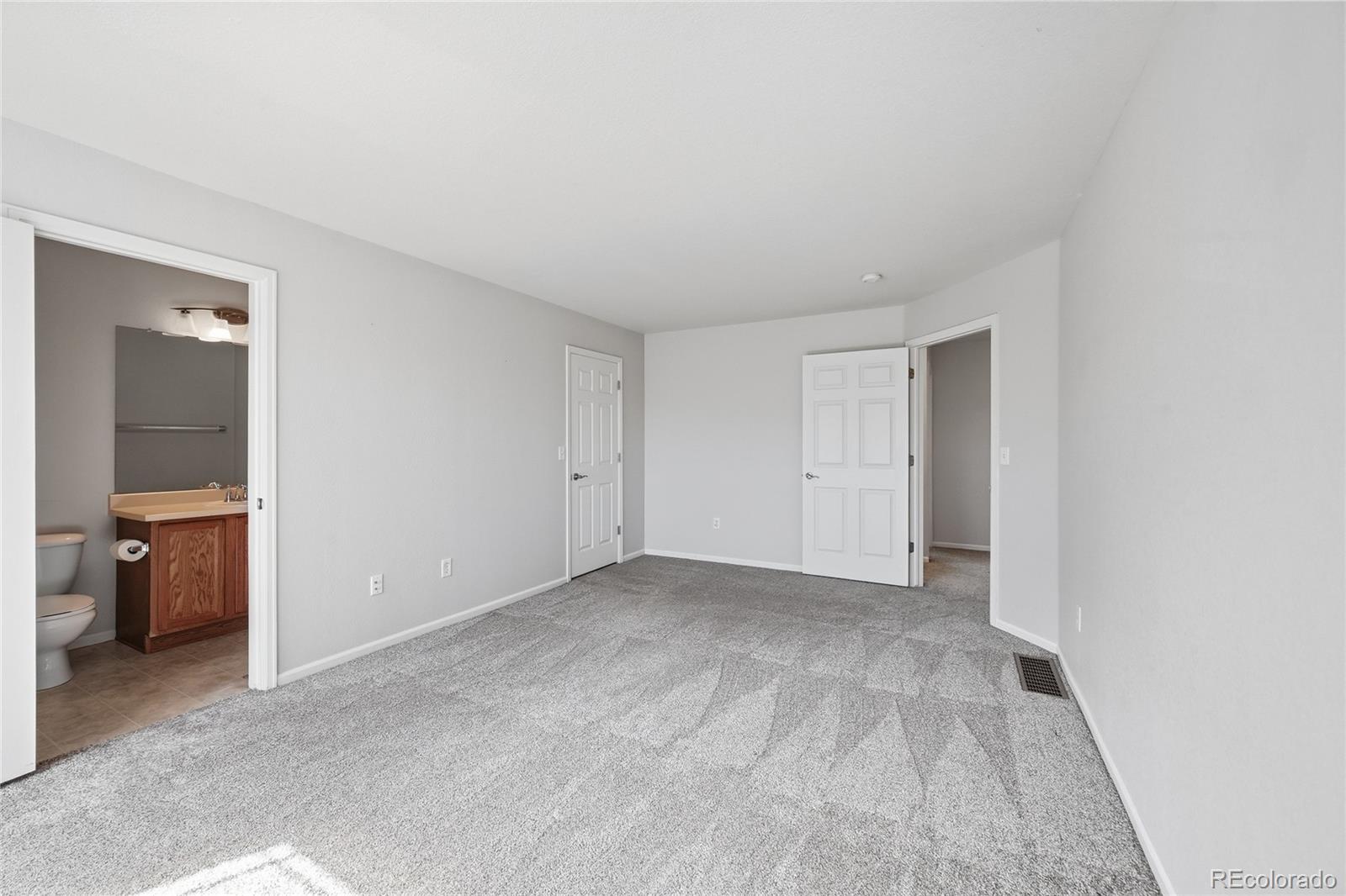 2075 Quartz Street Castle Rock, CO 80109 - Photo 15 of 25 a view of an empty room and fire pit