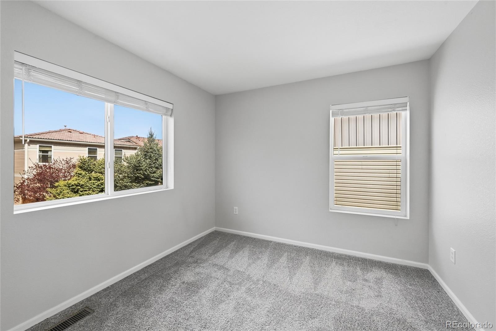 2075 Quartz Street Castle Rock, CO 80109 - Photo 21 of 25 an empty room with a window