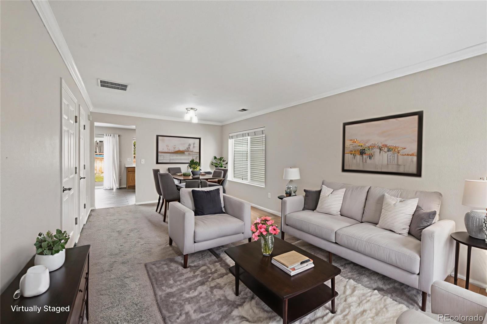 2075 Quartz Street Castle Rock, CO 80109 - Photo 4 of 25 a living room with furniture and a couch