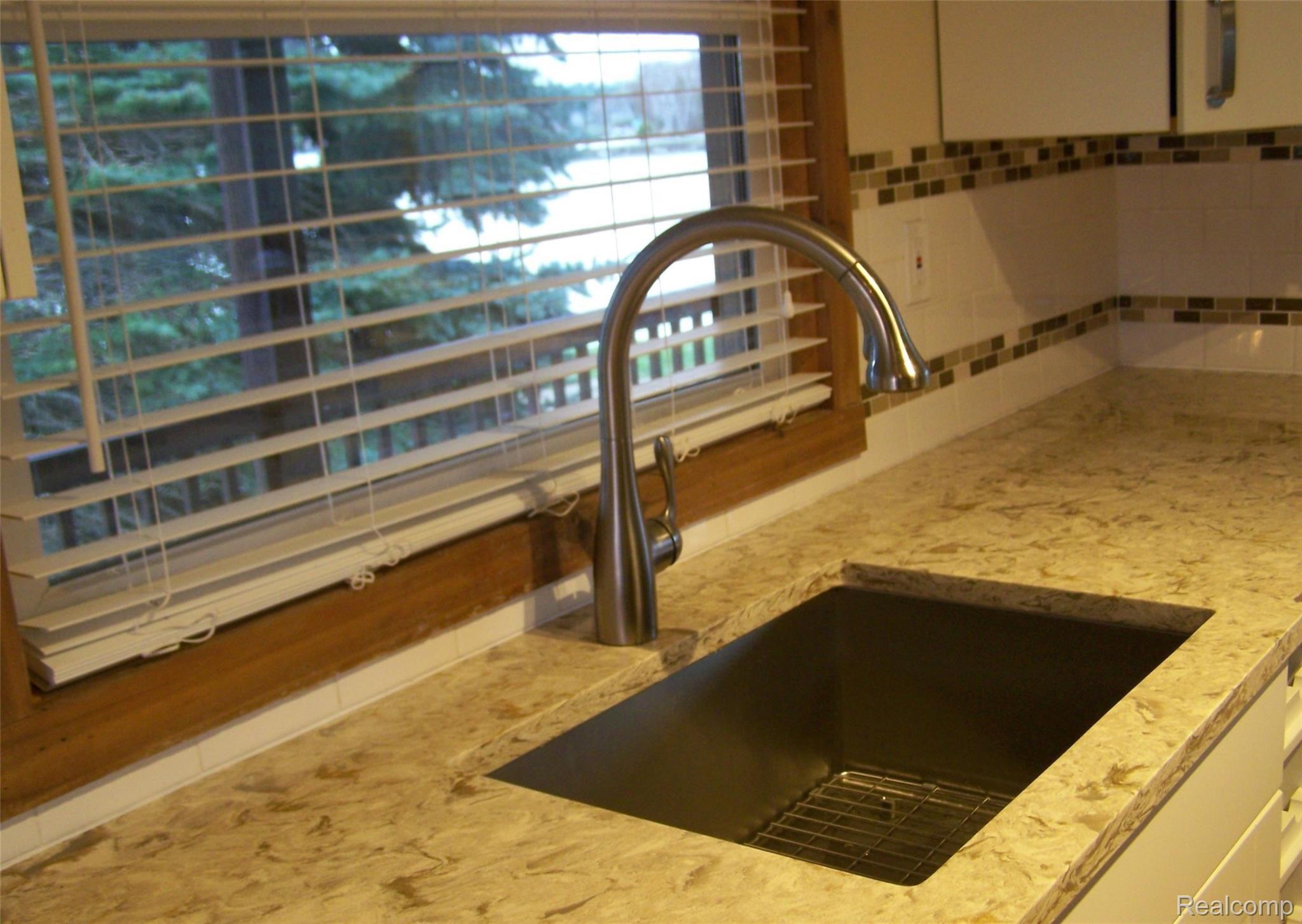 3325 Pointe Aux Barques Road Port Austin, MI 48467 - Photo 6 of 42 Sink Kitchen Look to Water.JPG