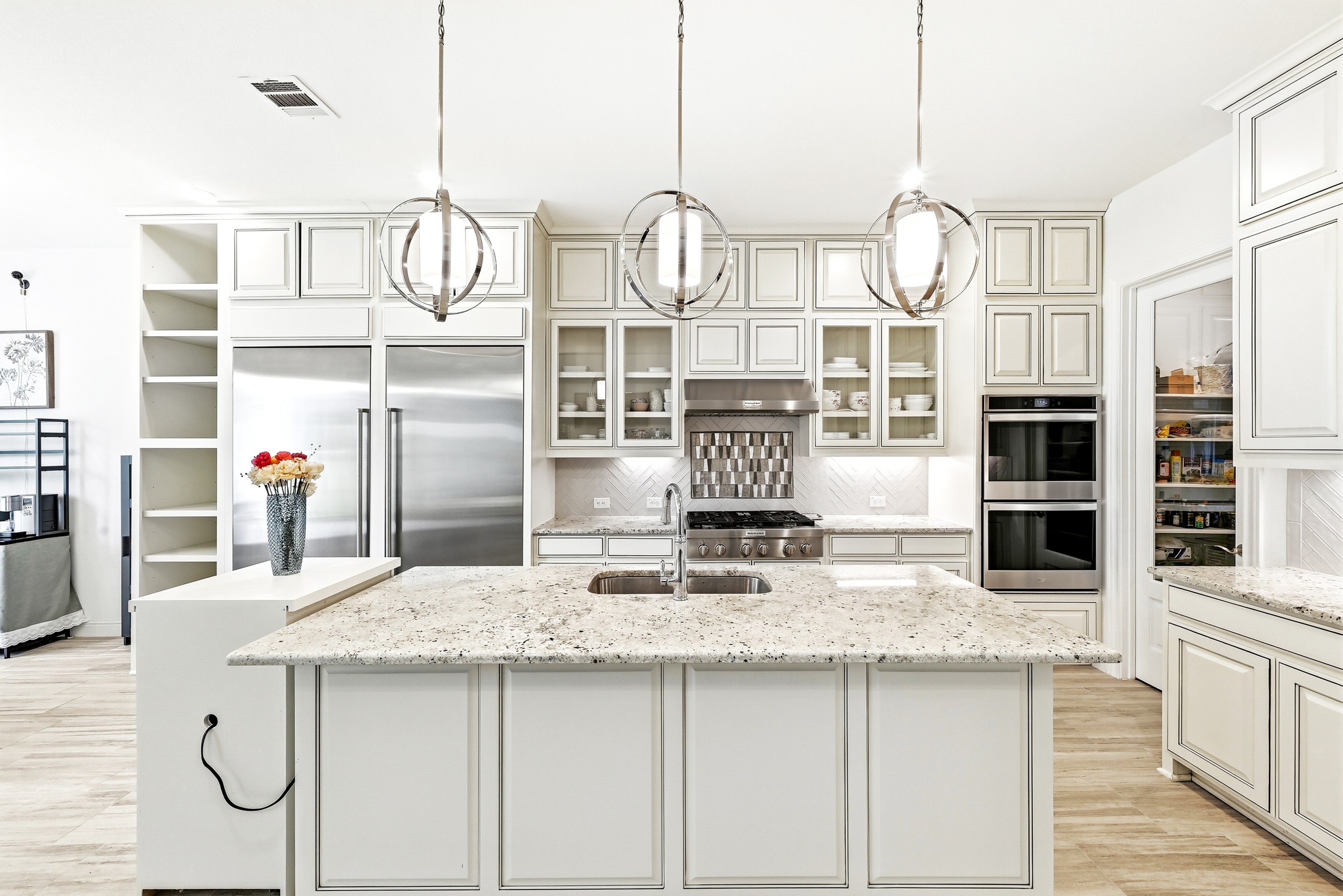 4601 Apollonia Way Leander, TX 78641 - Photo 5 of 40 a kitchen with stainless steel appliances granite countertop a sink and cabinets