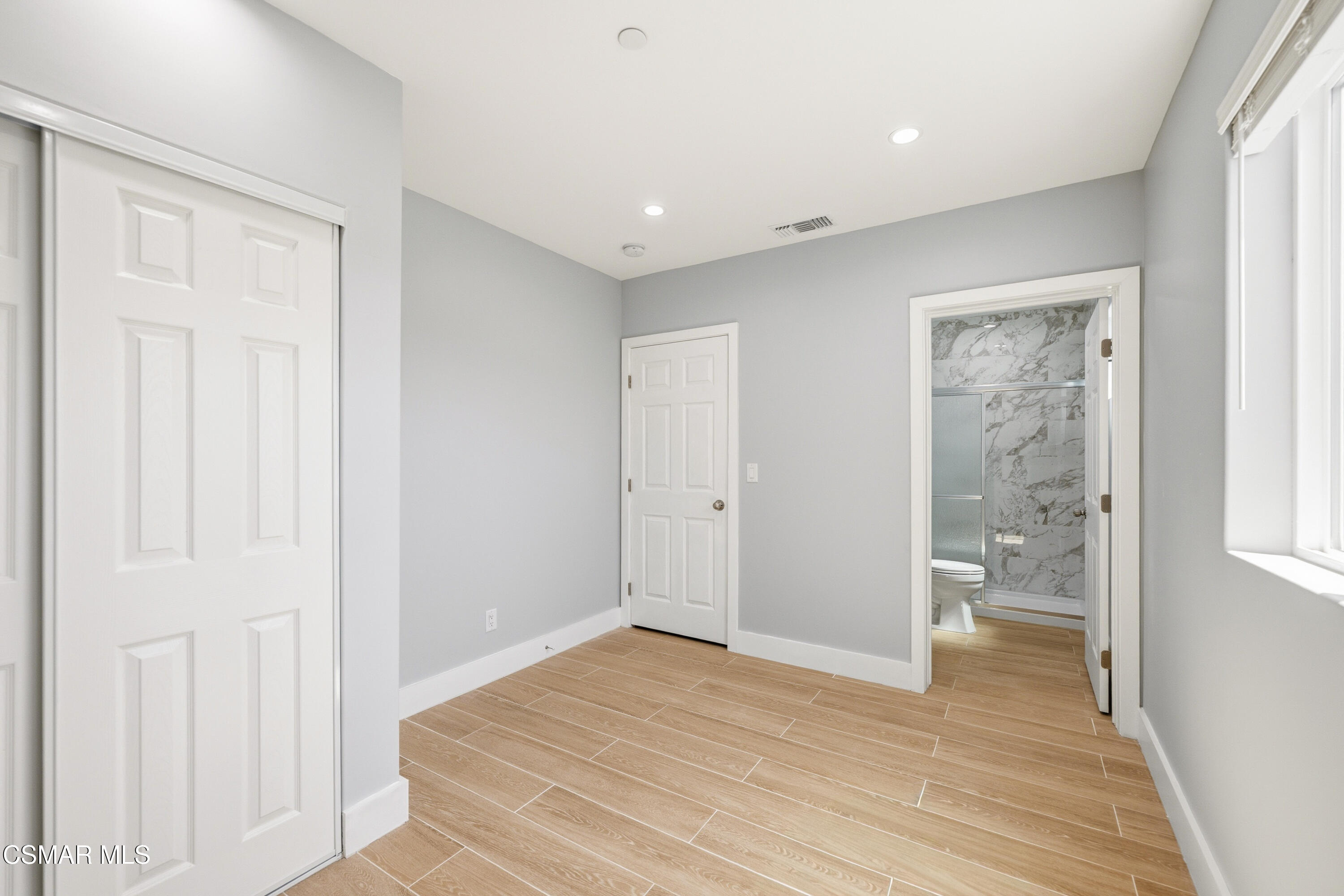 13102 Filmore Street Pacoima, CA 91331 - Photo 14 of 15 a bathroom with a sink and a shower