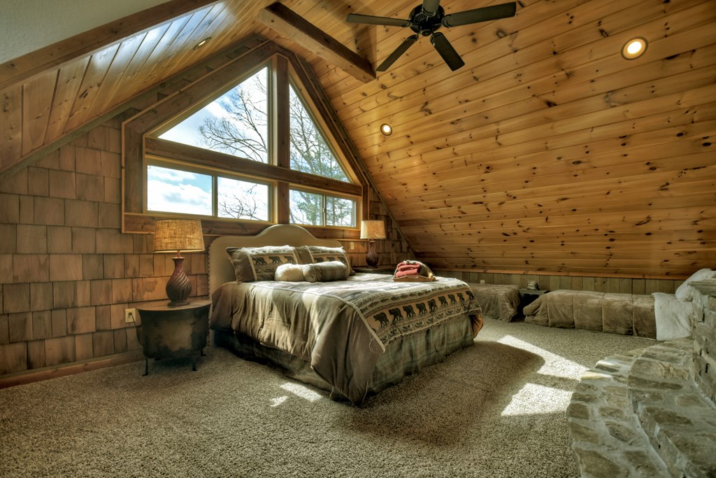 101 Falling Rock Road Cherry Log, GA 30522 - Photo 42 of 70 a bedroom with a bed and a balcony