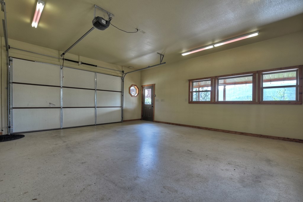 101 Falling Rock Road Cherry Log, GA 30522 - Photo 47 of 70 a view of a livingroom with an empty space and a window