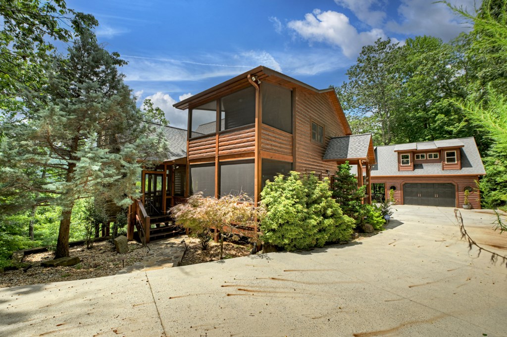 101 Falling Rock Road Cherry Log, GA 30522 - Photo 5 of 70 a front view of a house with a yard