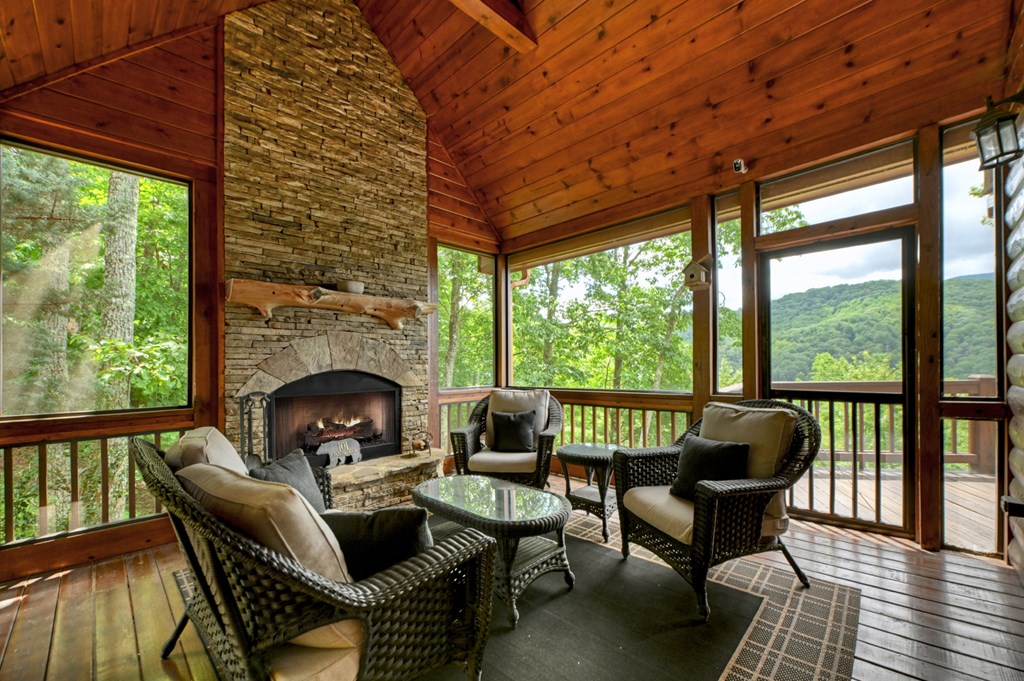 101 Falling Rock Road Cherry Log, GA 30522 - Photo 59 of 70 a living room with furniture and a fireplace