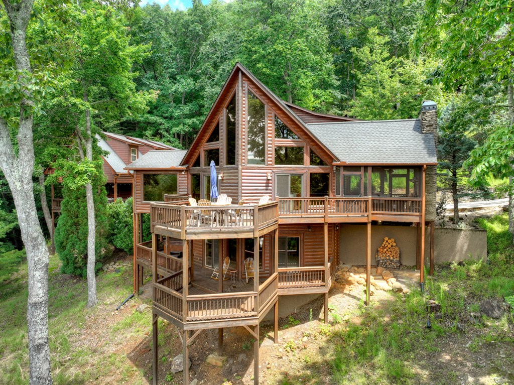 101 Falling Rock Road Cherry Log, GA 30522 - Photo 63 of 70 a front view of a house with a yard table and chairs
