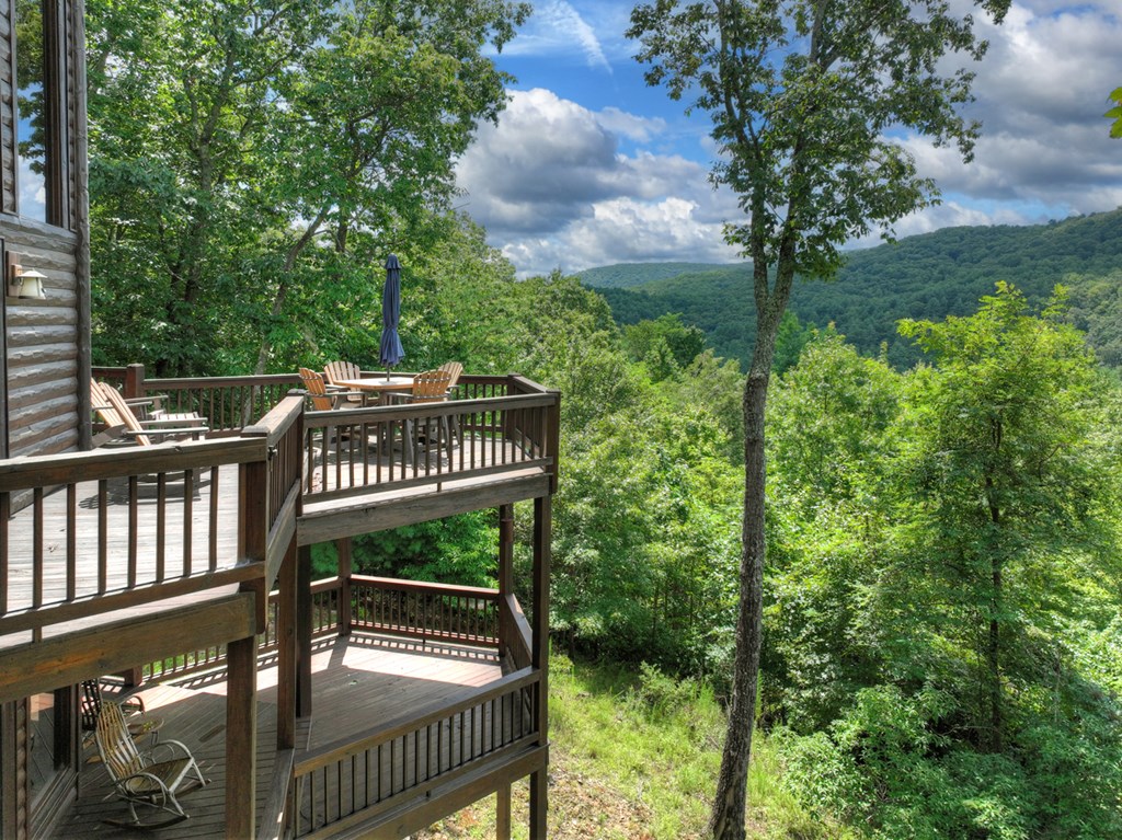 101 Falling Rock Road Cherry Log, GA 30522 - Photo 66 of 70 a view of a roof deck with wooden fence and floor