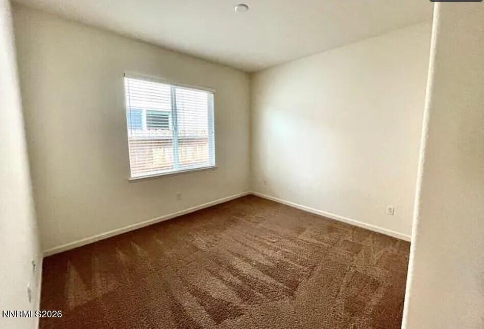 1987 Wind Walker Drive Reno, NV 89521 - Photo 15 of 16 an empty room with a window
