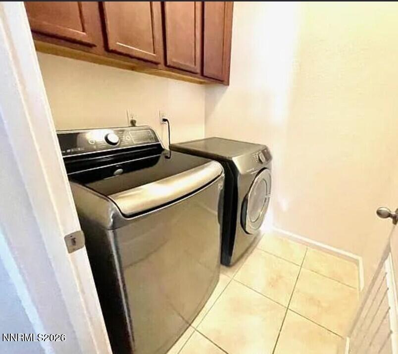 1987 Wind Walker Drive Reno, NV 89521 - Photo 2 of 16 a utility room with dryer and washer