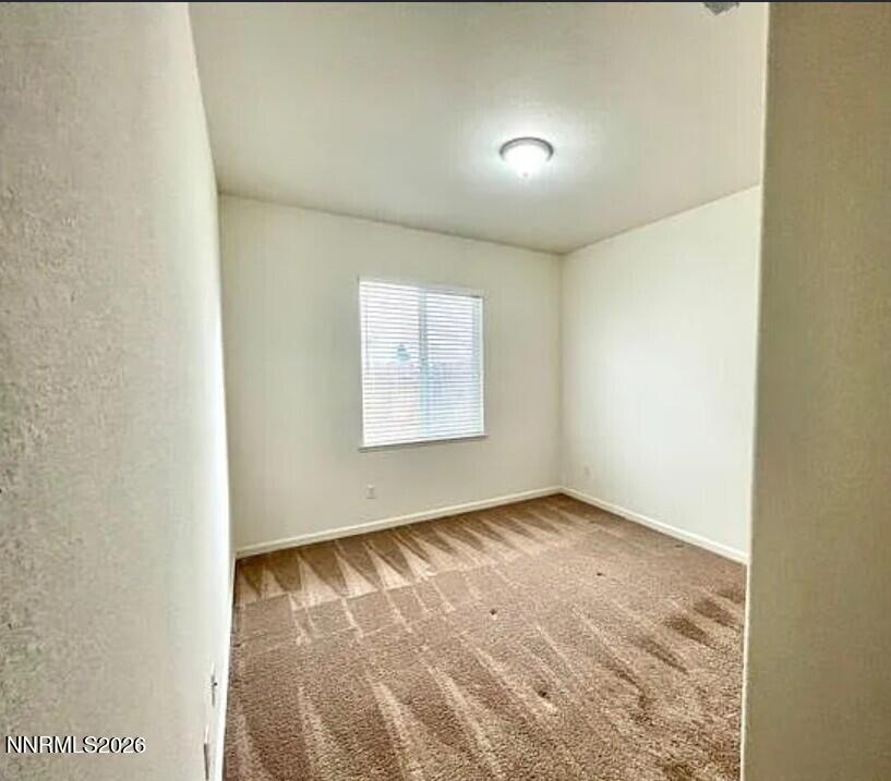 1987 Wind Walker Drive Reno, NV 89521 - Photo 3 of 16 an empty room with windows
