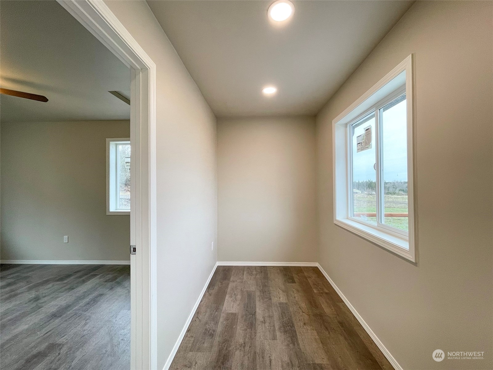 2023 Atterberry Road Sequim, WA 98382 - Photo 17 of 40 wooden floor in an empty room with a window