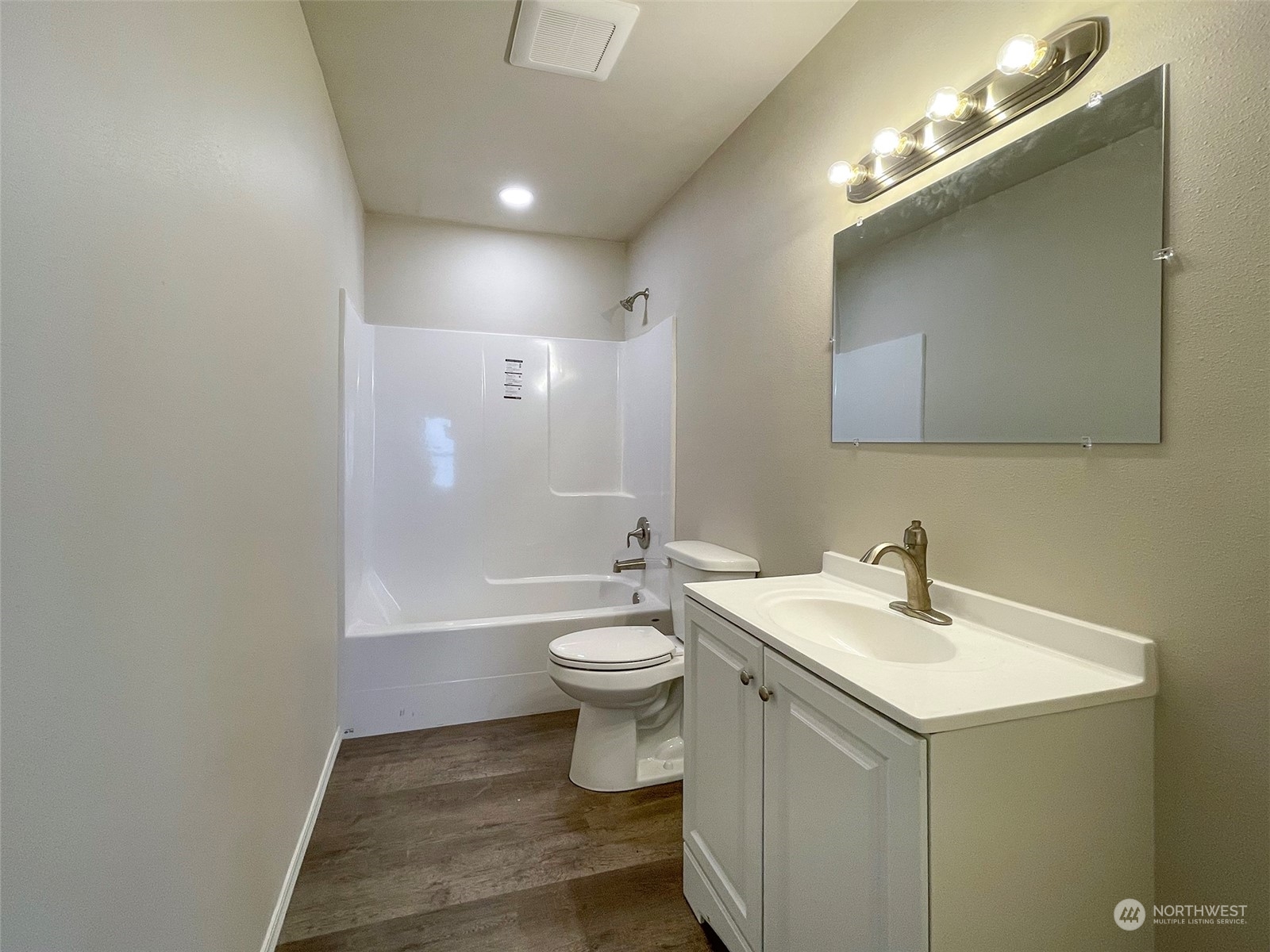 2023 Atterberry Road Sequim, WA 98382 - Photo 24 of 40 a bathroom with a sink a toilet and shower