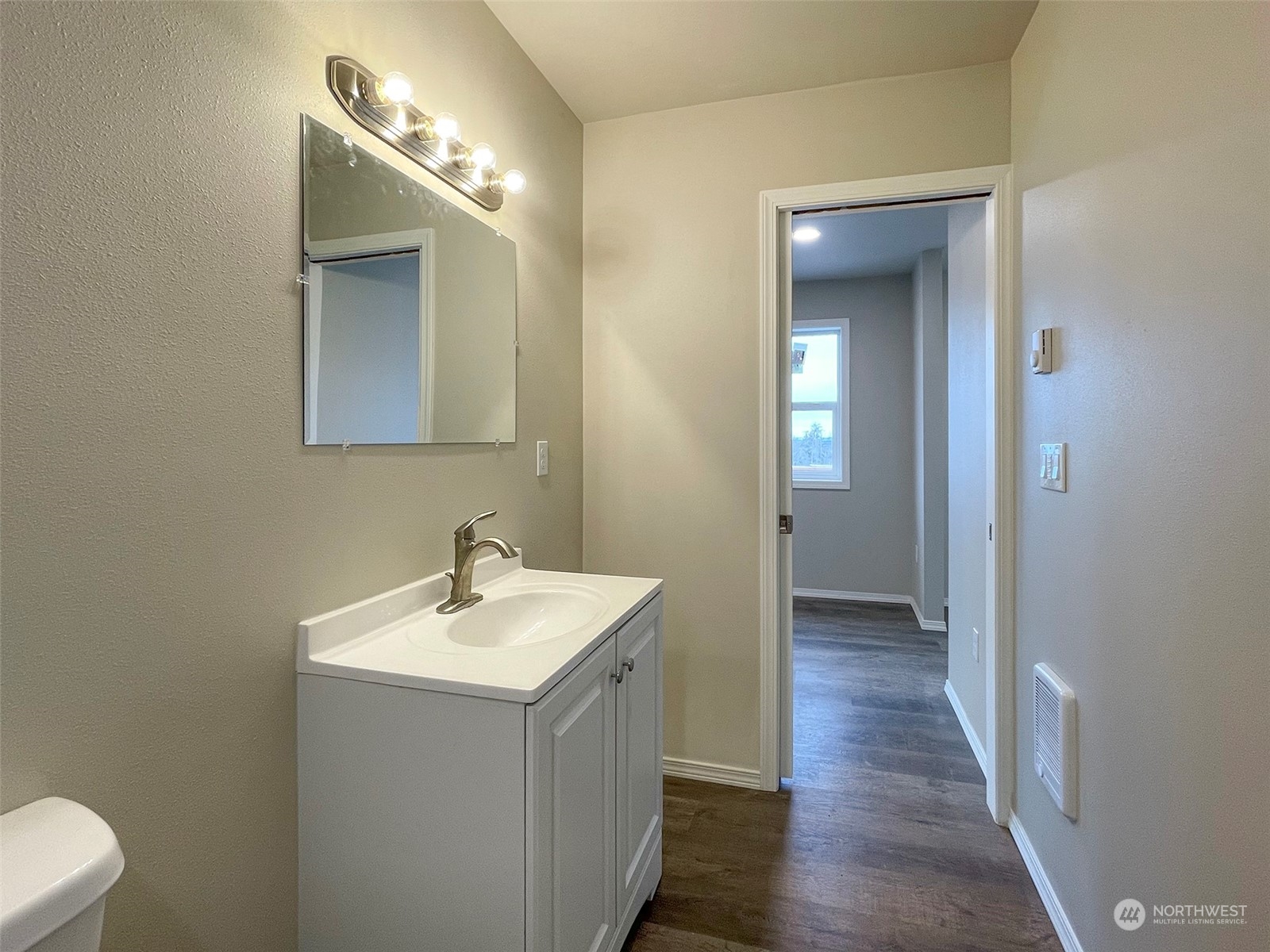 2023 Atterberry Road Sequim, WA 98382 - Photo 25 of 40 a bathroom with a sink and a mirror