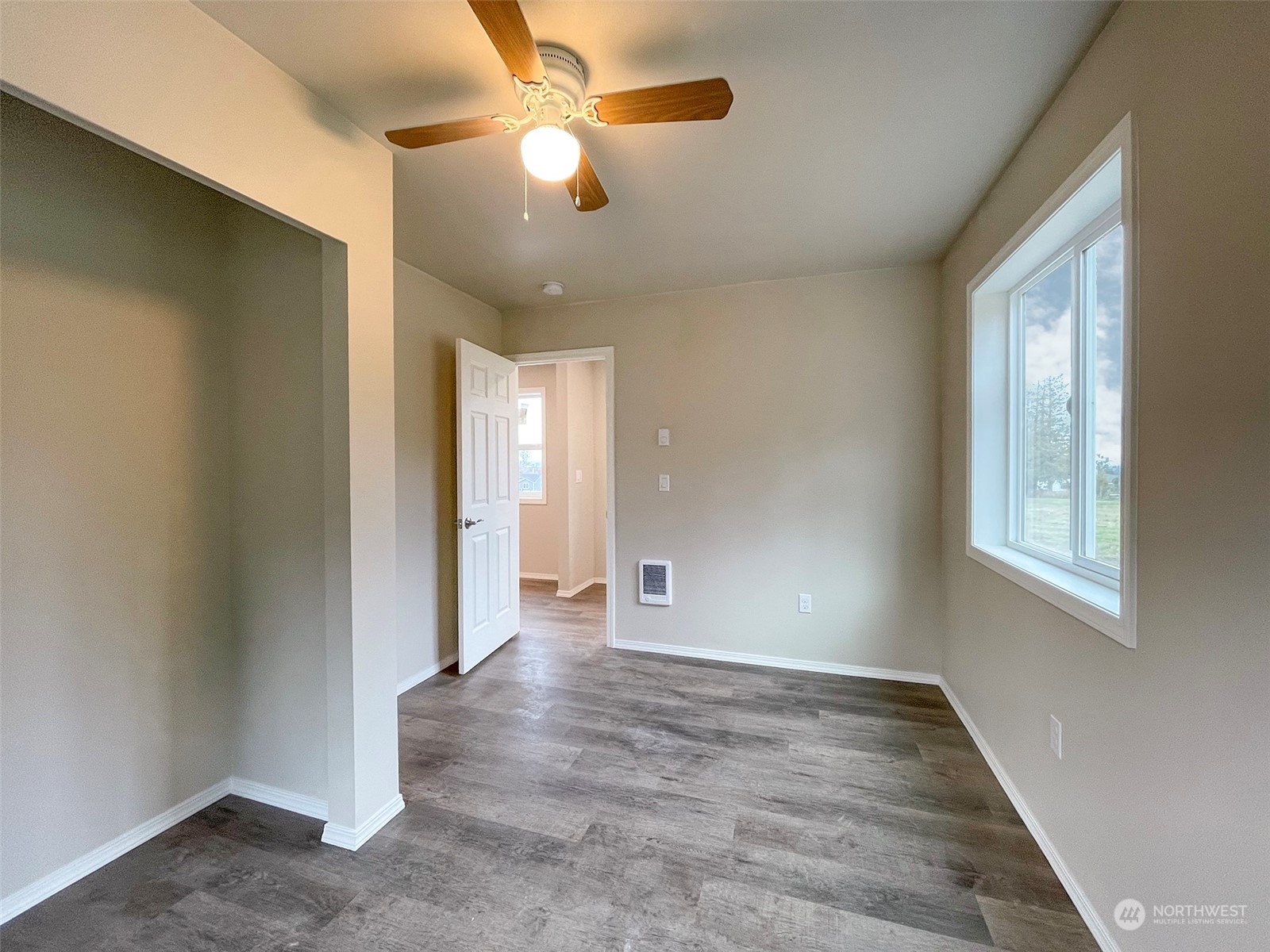 2023 Atterberry Road Sequim, WA 98382 - Photo 29 of 40 wooden floor in an empty room with a window