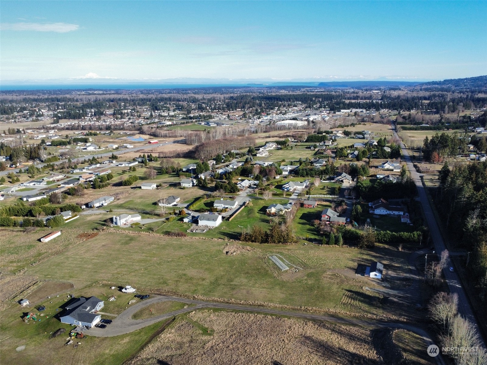 2023 Atterberry Road Sequim, WA 98382 - Photo 33 of 40 an aerial view of a residential houses with city view