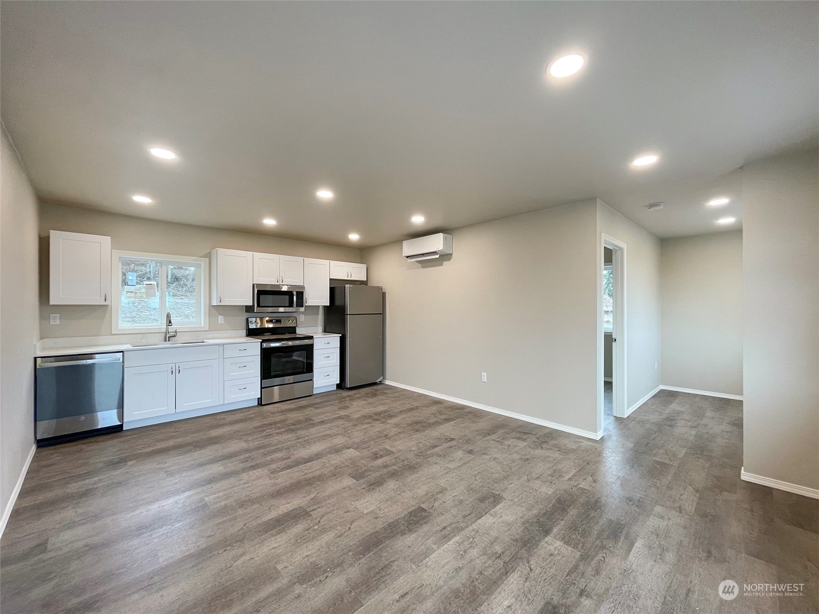 2023 Atterberry Road Sequim, WA 98382 - Photo 9 of 40 a large kitchen with a stove a sink and a refrigerator