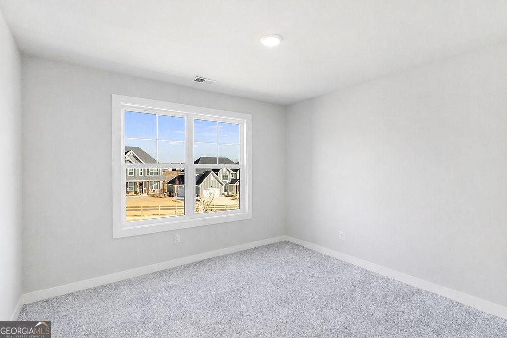 2604 Parkside Way Gainesville, GA 30507 - Photo 18 of 33 an empty room with windows and view