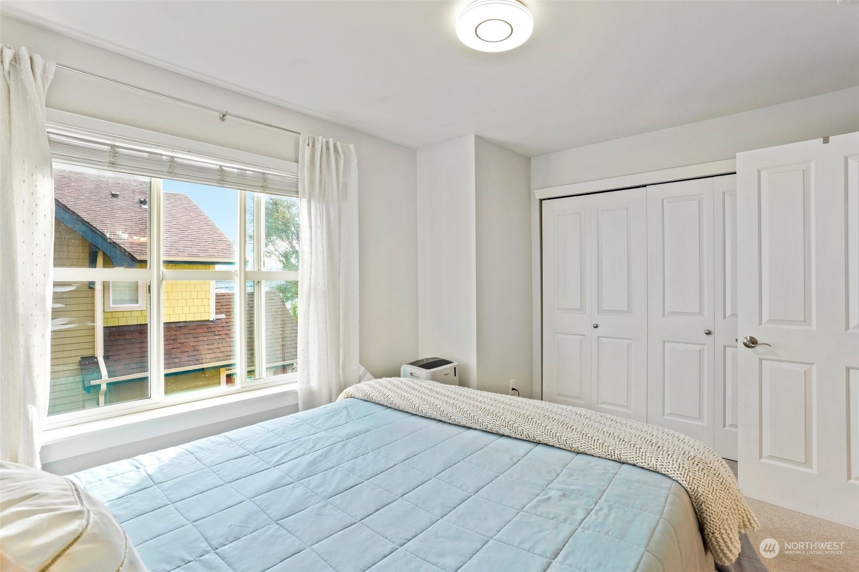 1127 Campbell Way Bremerton, WA 98310 - Photo 21 of 39 a bedroom with a bed and a window