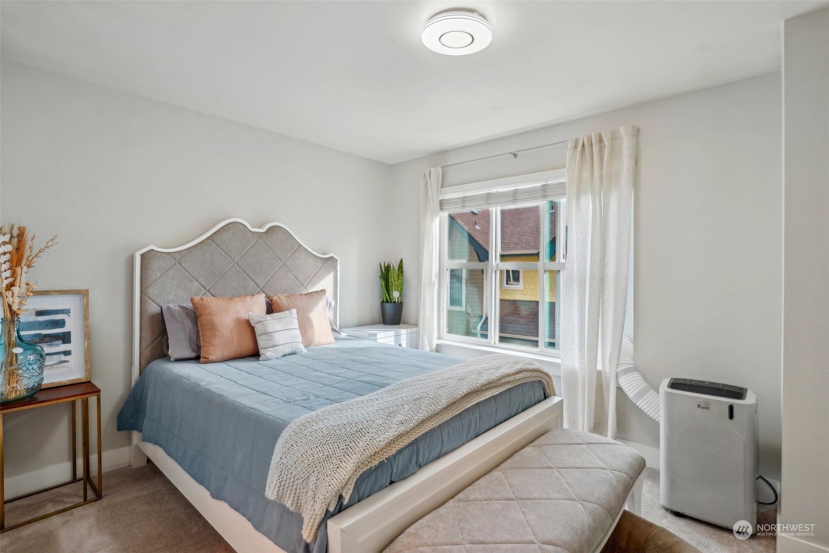 1127 Campbell Way Bremerton, WA 98310 - Photo 23 of 39 a bedroom with a bed and a window