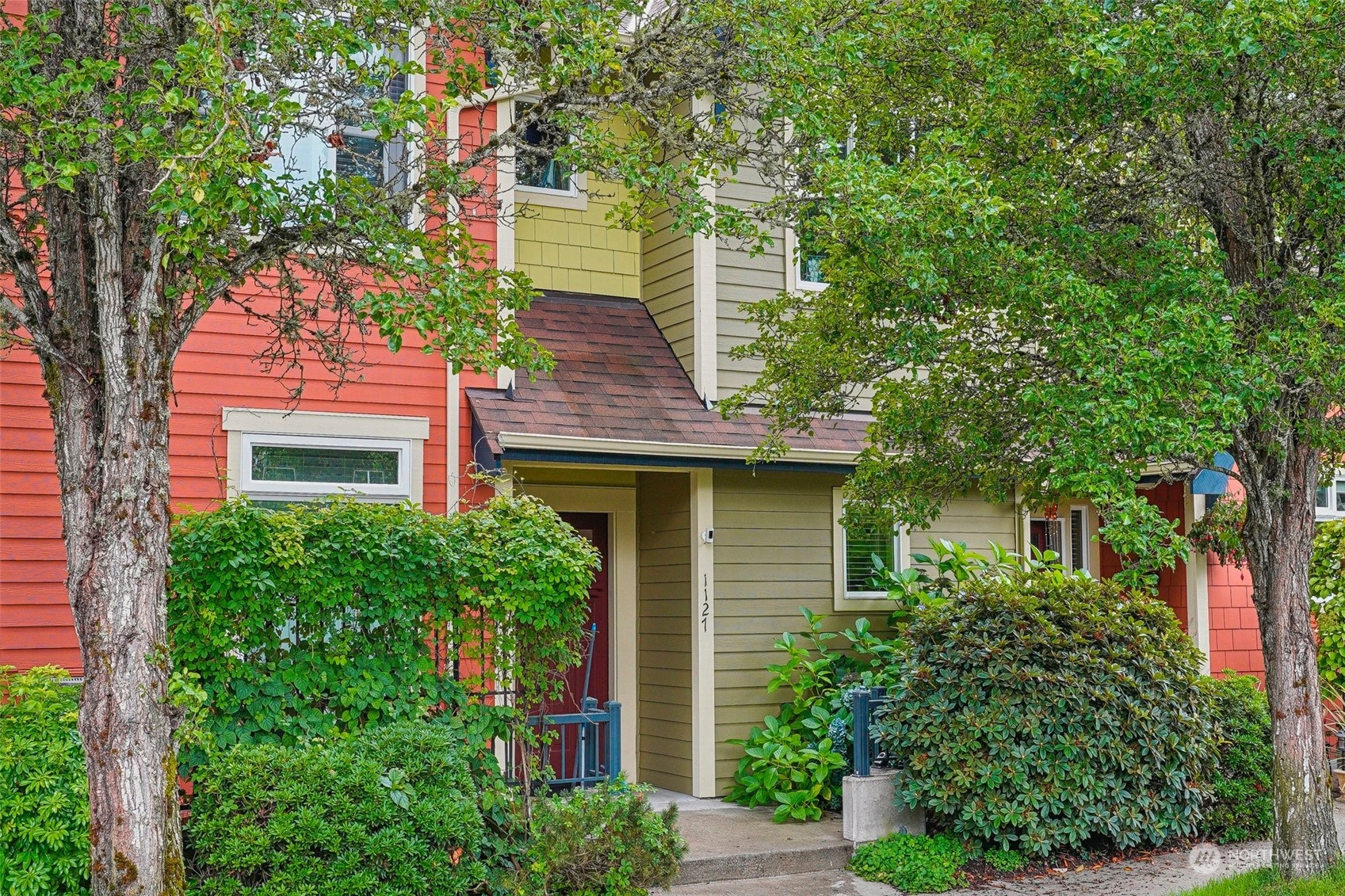 1127 Campbell Way Bremerton, WA 98310 - Photo 3 of 39 a front view of a house with a yard
