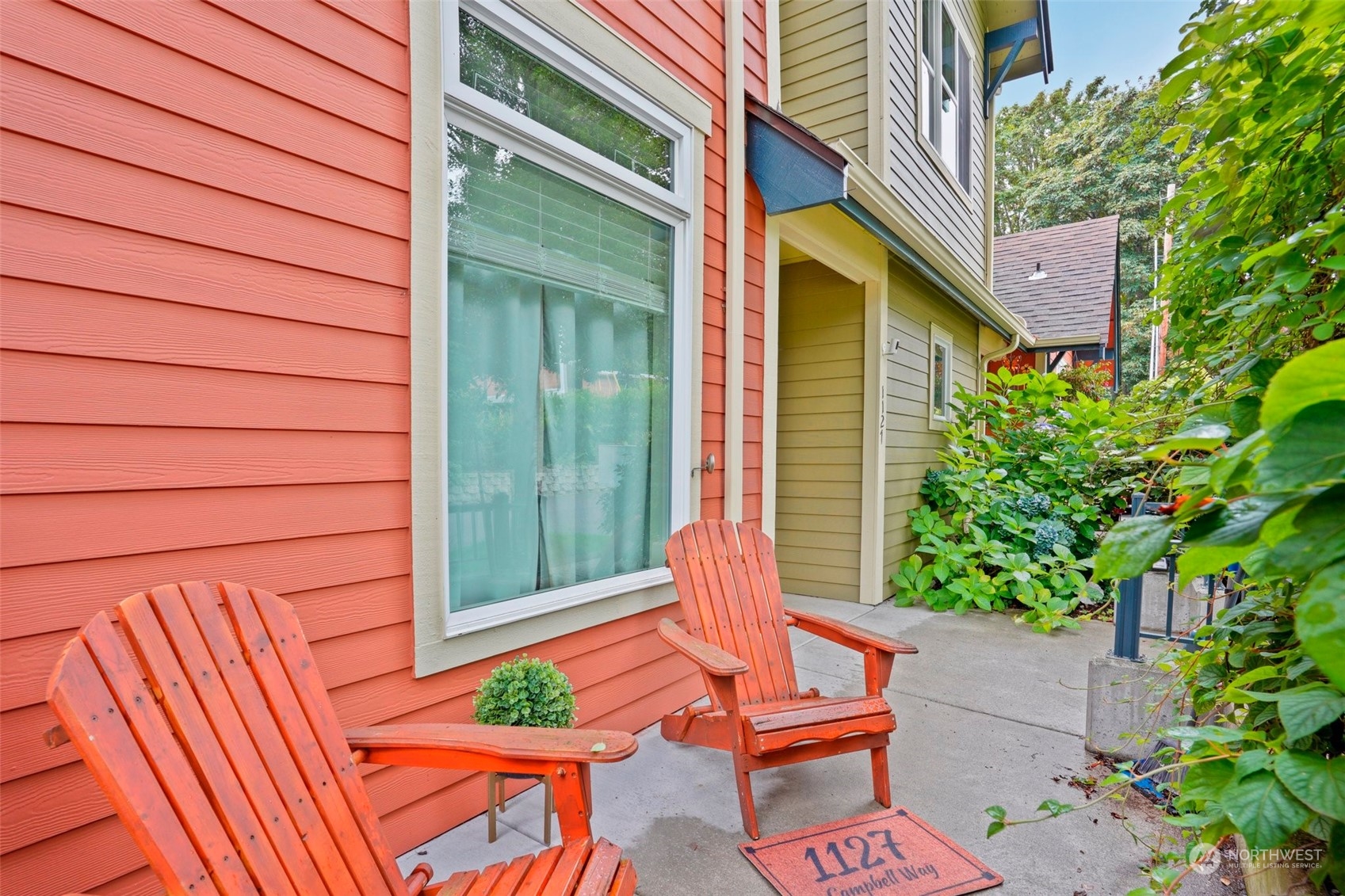 1127 Campbell Way Bremerton, WA 98310 - Photo 7 of 39 a backyard of a house with seating space