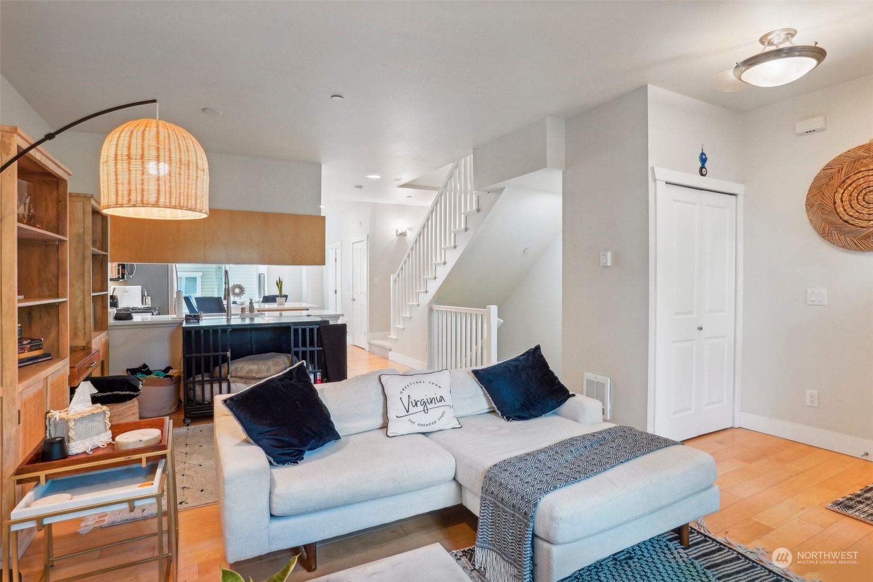 1127 Campbell Way Bremerton, WA 98310 - Photo 10 of 39 a living room with furniture a fireplace and a chandelier