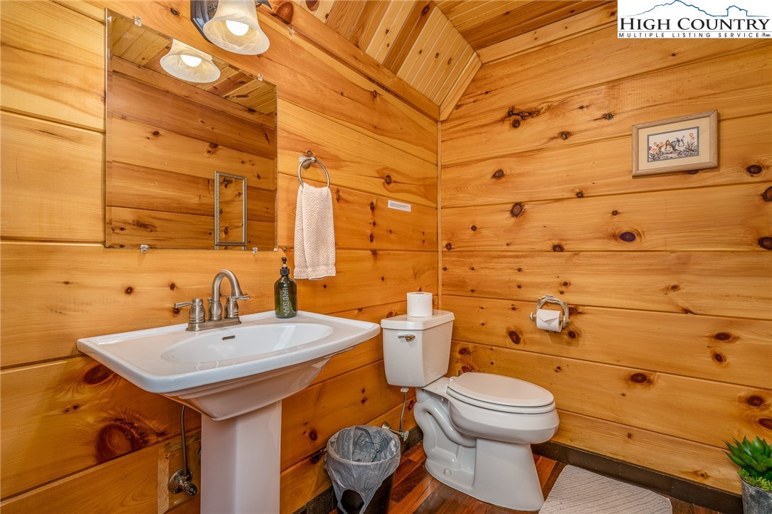 502 Poga Road Butler, TN 37640 - Photo 23 of 50 a bathroom with a sink and a toilet