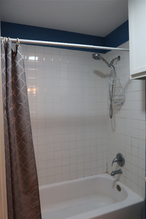 2210 Pearl Street, Unit 303 Austin, TX 78705 - Photo 11 of 23 a bathroom with a shower and a sink