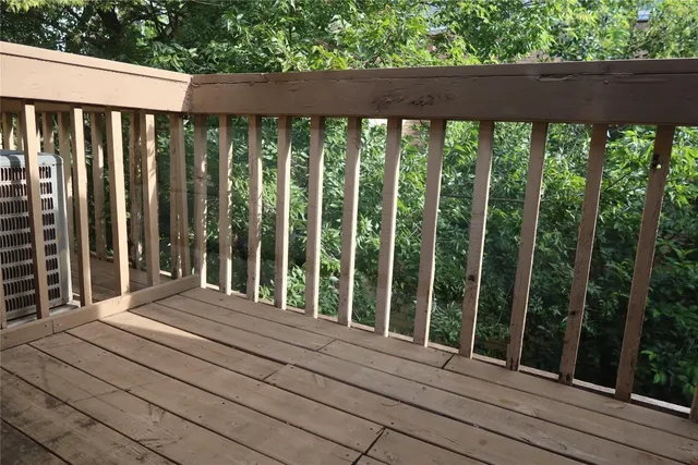 a balcony view with a garden